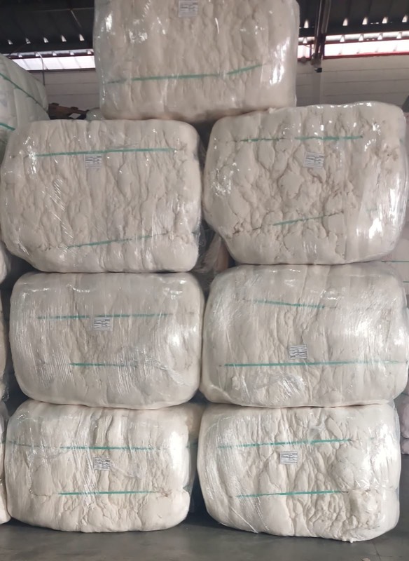 White recycled cotton bales wrapped and labelled